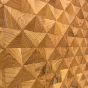 Teak Pyramid wooden wall paneling by Java Creations crafted from real teak wood, showcasing premium 3D wall panels with acoustic benefits and luxury interior design appeal.