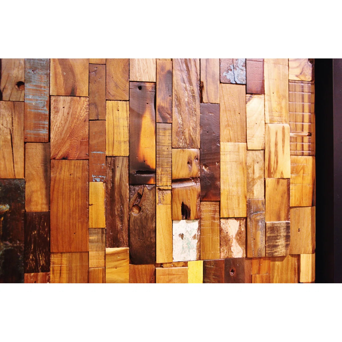 Wooden wall panel with various wooden blocks of different sizes and colors.